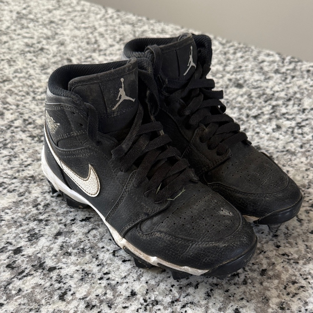 Jordan Black and White Mid  Football Cleats
